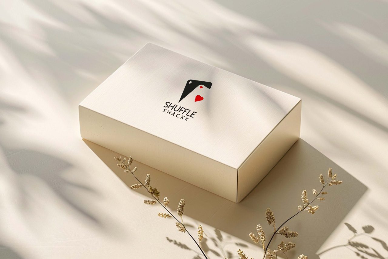 Shuffle logo on a cream packaging box in soft daylight