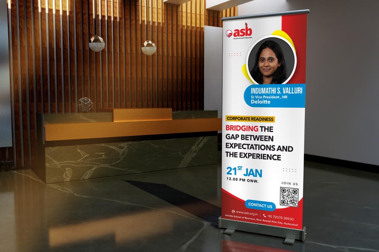 Roll-up banner stand for a corporate leadership session in a hotel lobby
